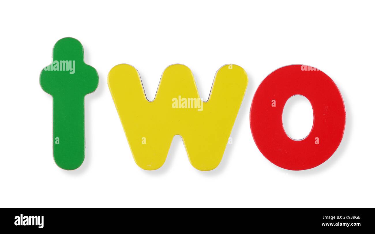 two coloured magnetic letters on white with clipping path concept Stock Photo
