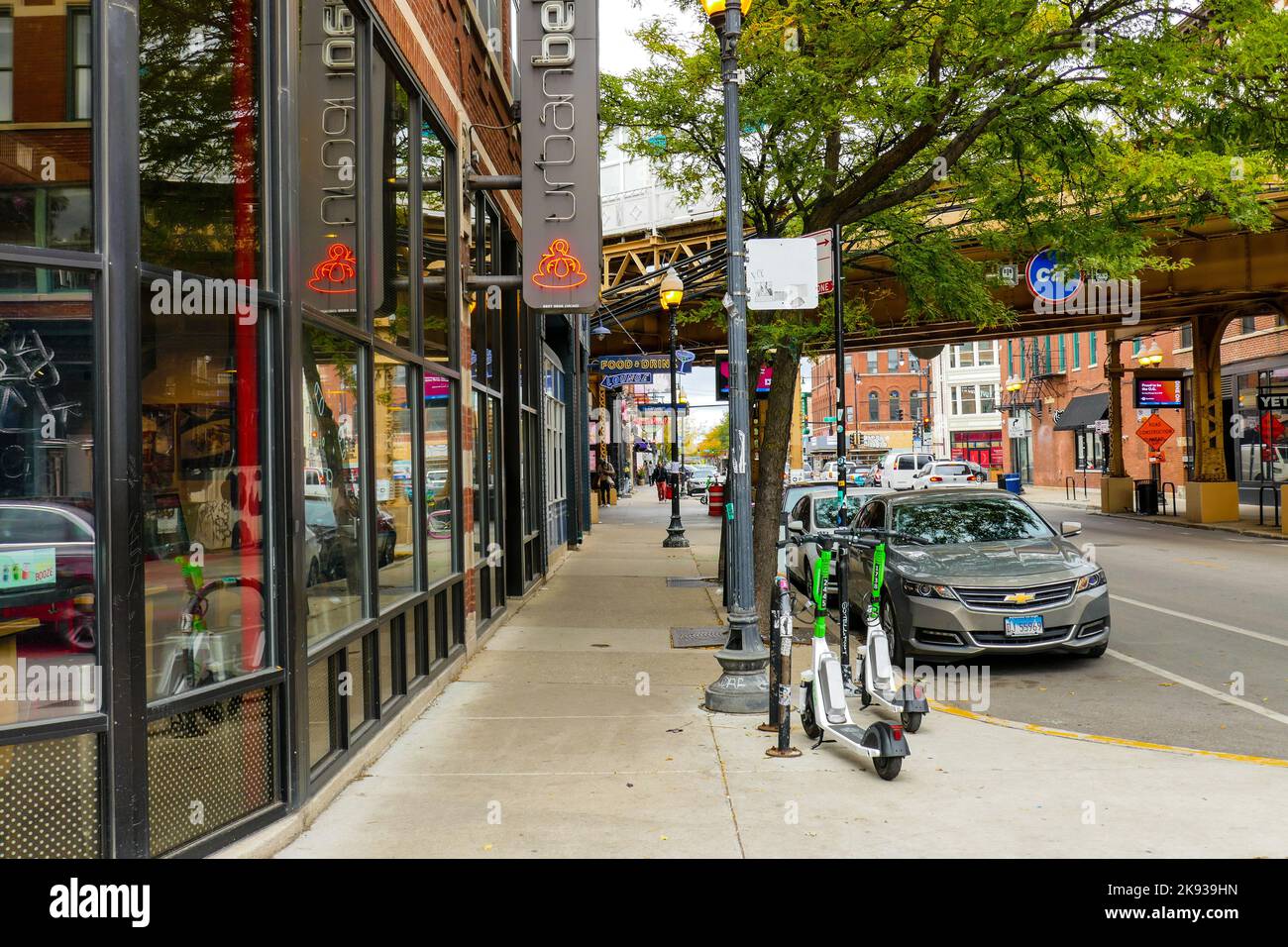 Rental electric scooters parked near Damen Avenue Blue Line Station