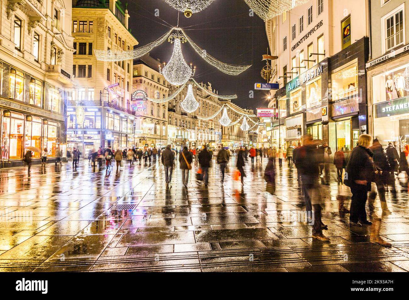 VIENNA, AUSTRIA - NOVEMBER 26: famous Graben street by night on November 26,2010 in Vienna, Austria. The Graben traces its origin back to the old Roma Stock Photo