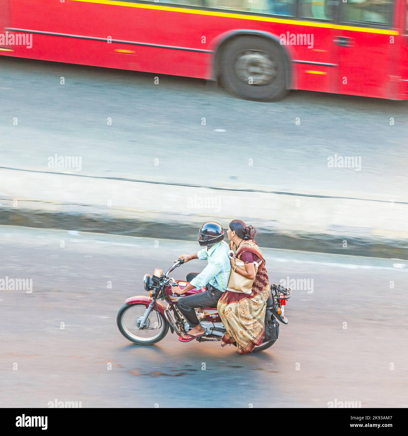 JAIPUR, INDIA NOV 13, 2011 couple riding on a bike (blurred motion