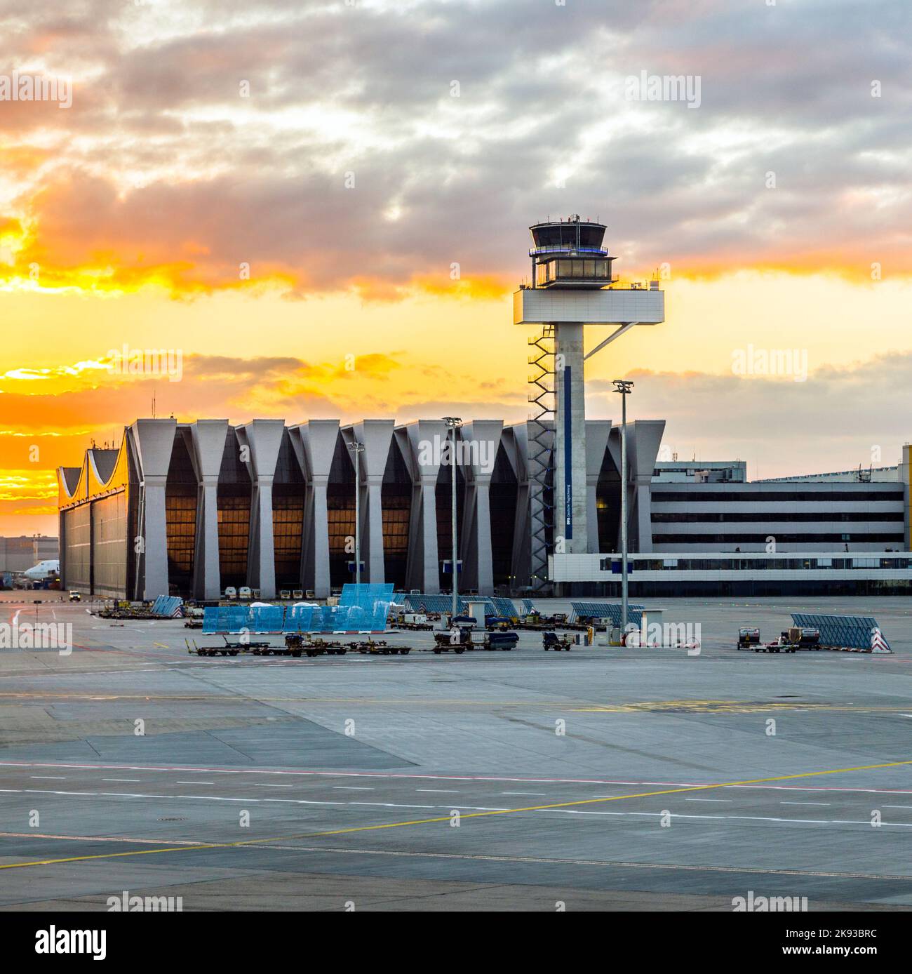 FRANKFURT, GERMANY - OCTOBER 24, 2013: Terminal 2 in sunset in Frankfurt, Germany. It is one of the busiest airport in Europe with 59 million passenge Stock Photo
