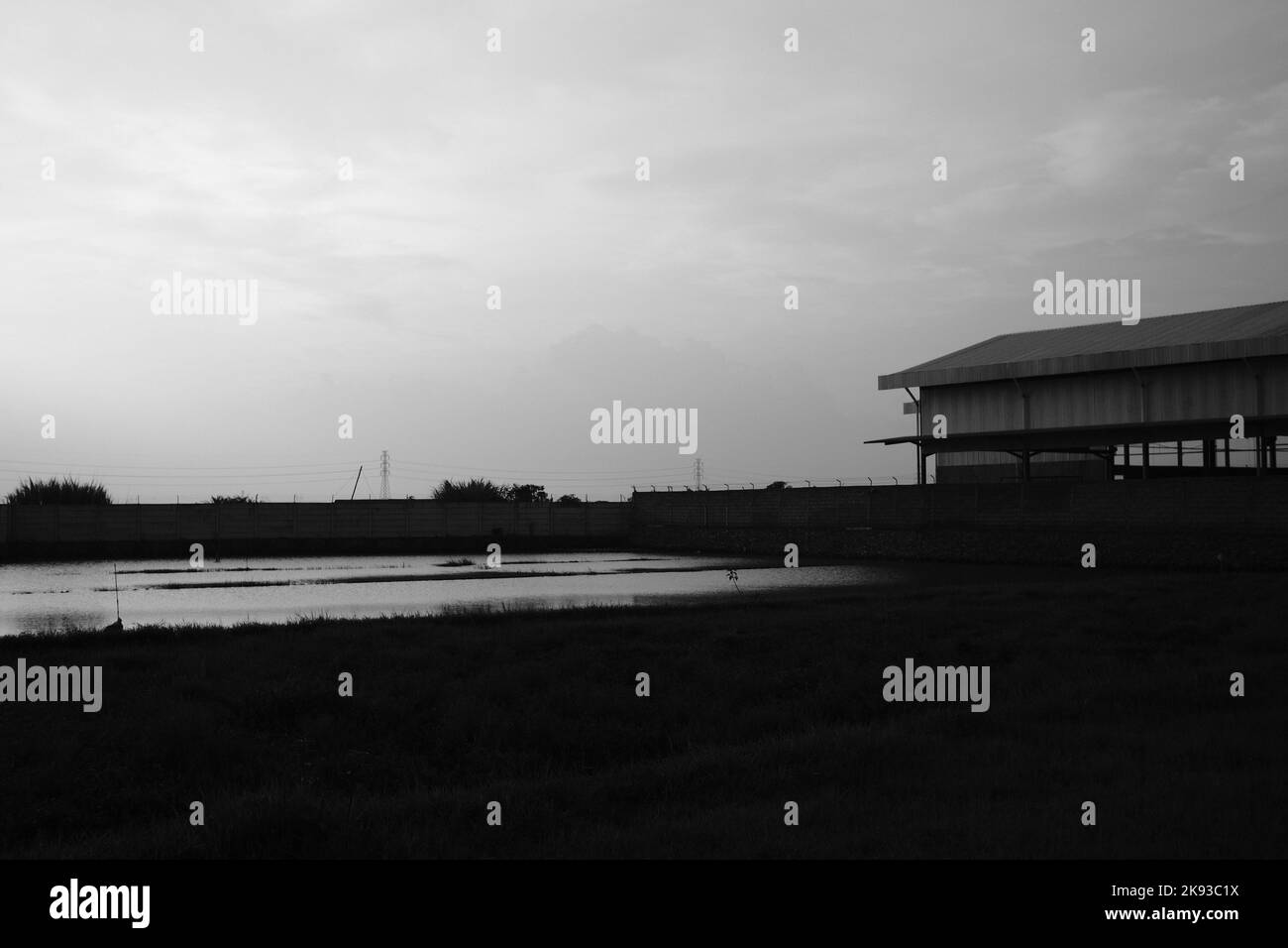 Black and white photo, Monochrome photo of silhouette of a rice barn on a farm in Cicalengka - Indonesia Stock Photo