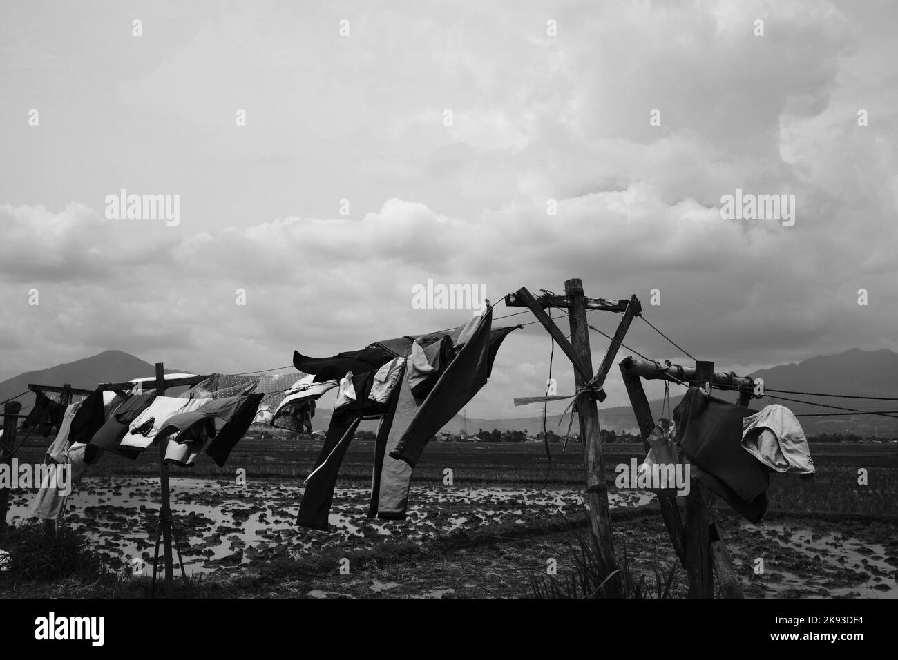Black and white photo, Monochrome photo of clothes drying in the sun in the Cikancung area - Indonesia Stock Photo