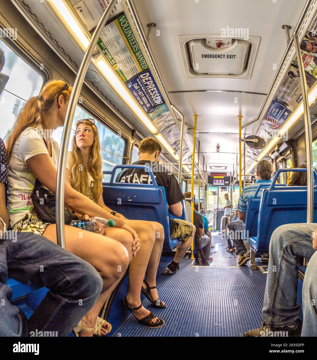 MIAMI, USA - AUG 18, 2014: people in the downtown Metro bus in Miami ...