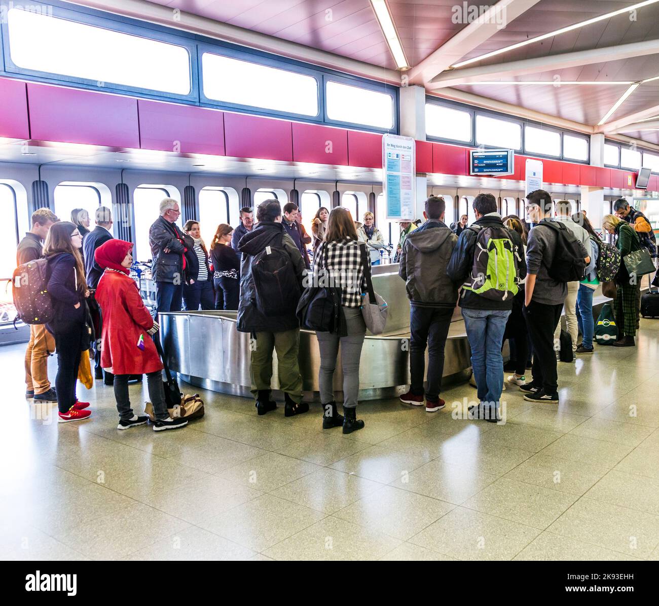BERLIN, GERMANY OCT 27, 2014 people wait at baggage belt in Tegel