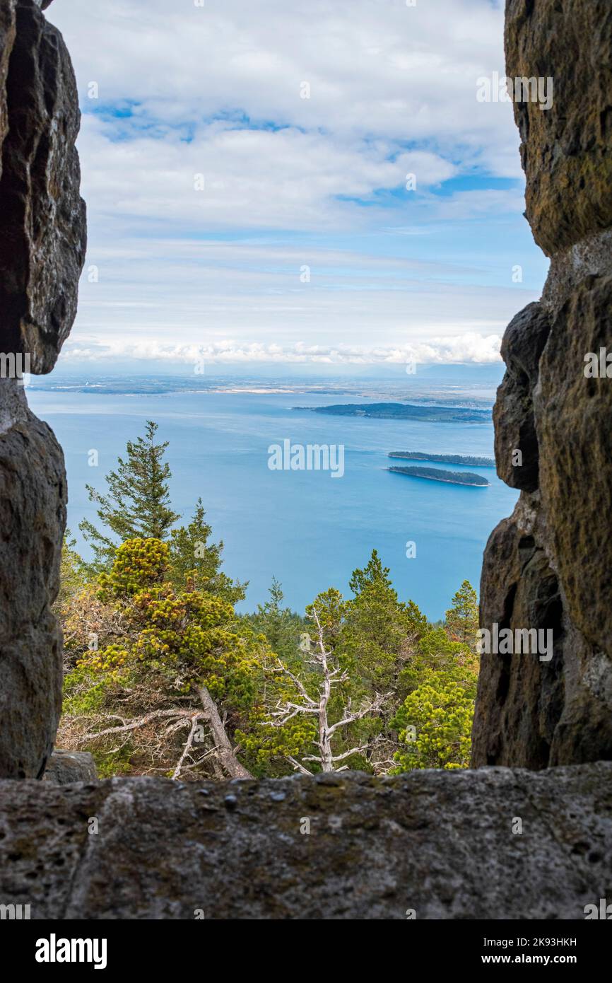 A peak-a-boo view of a few of the San Juan islands from the watch tower atop Mount Constitution on Orcas Island, Washington, USA. Stock Photo