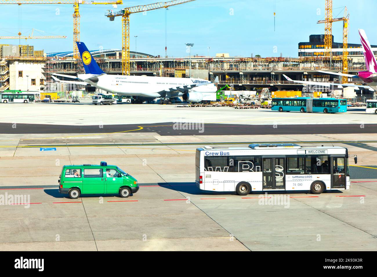 FRANKFURT, GERMANY - AUG 25: Crewbus and customs police ready to reveive the incoming Flight at Terminal A on August, 25, 2011 in Frankfurt, Germany. Stock Photo