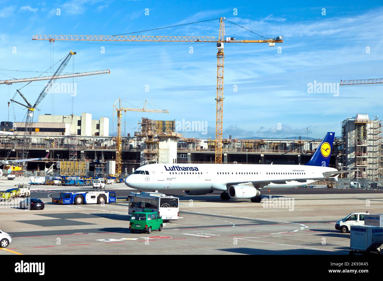 FRANKFURT, GERMANY - AUG 25, 2011: Lufthansa Flight ready to head to runway  in Frankfurt, Germany. New Terminal A is under construction for airport e Stock Photo
