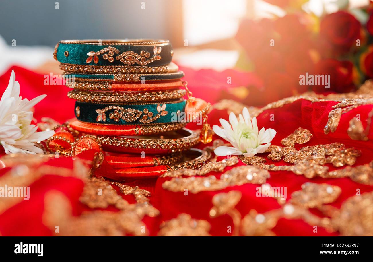 Embrace your inner queen with these exquisite bangles. beautiful bangles for a bride to wear at a traditional wedding. Stock Photo