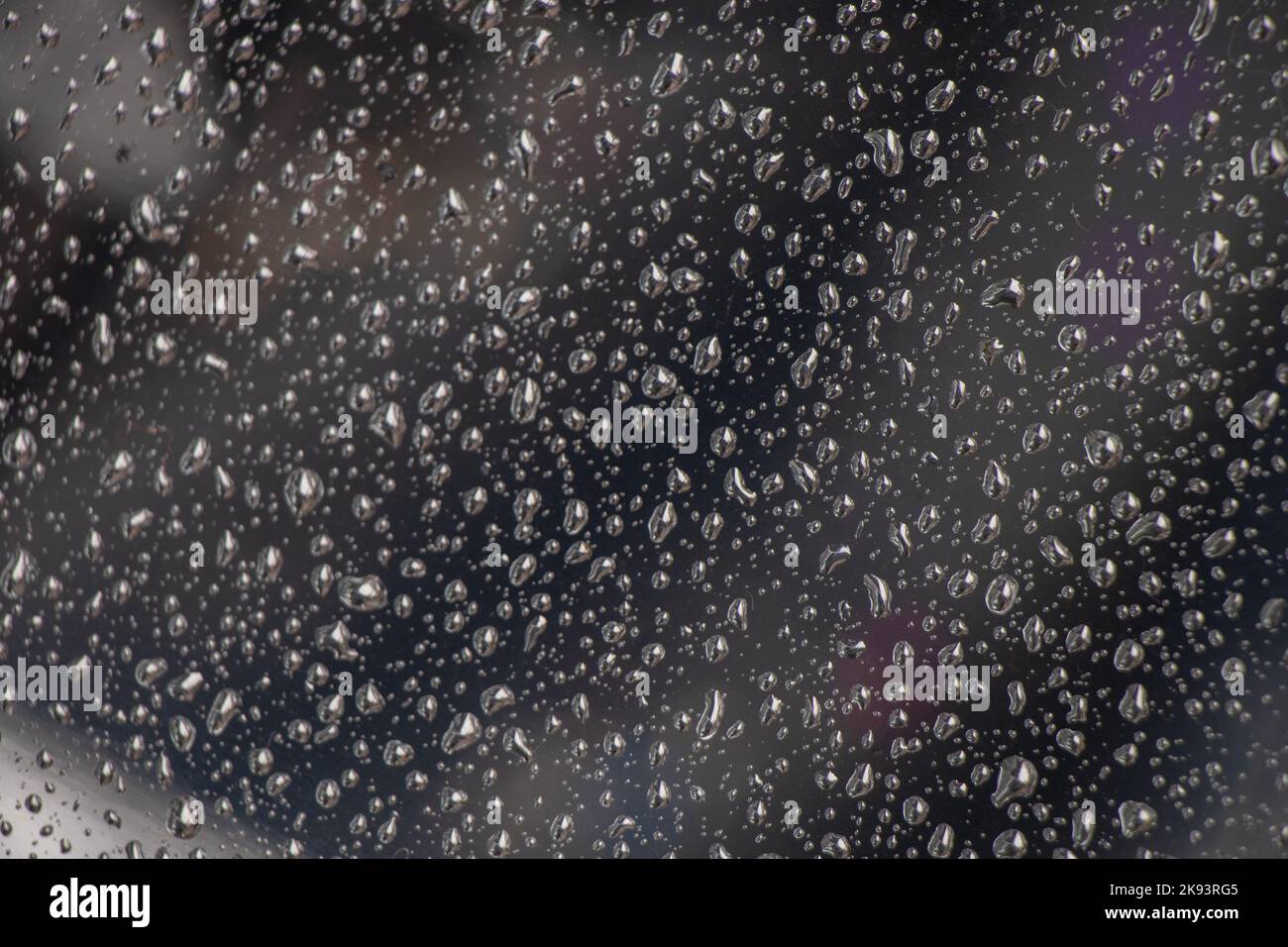 drops of water on a glass window after rain as a background Stock Photo ...