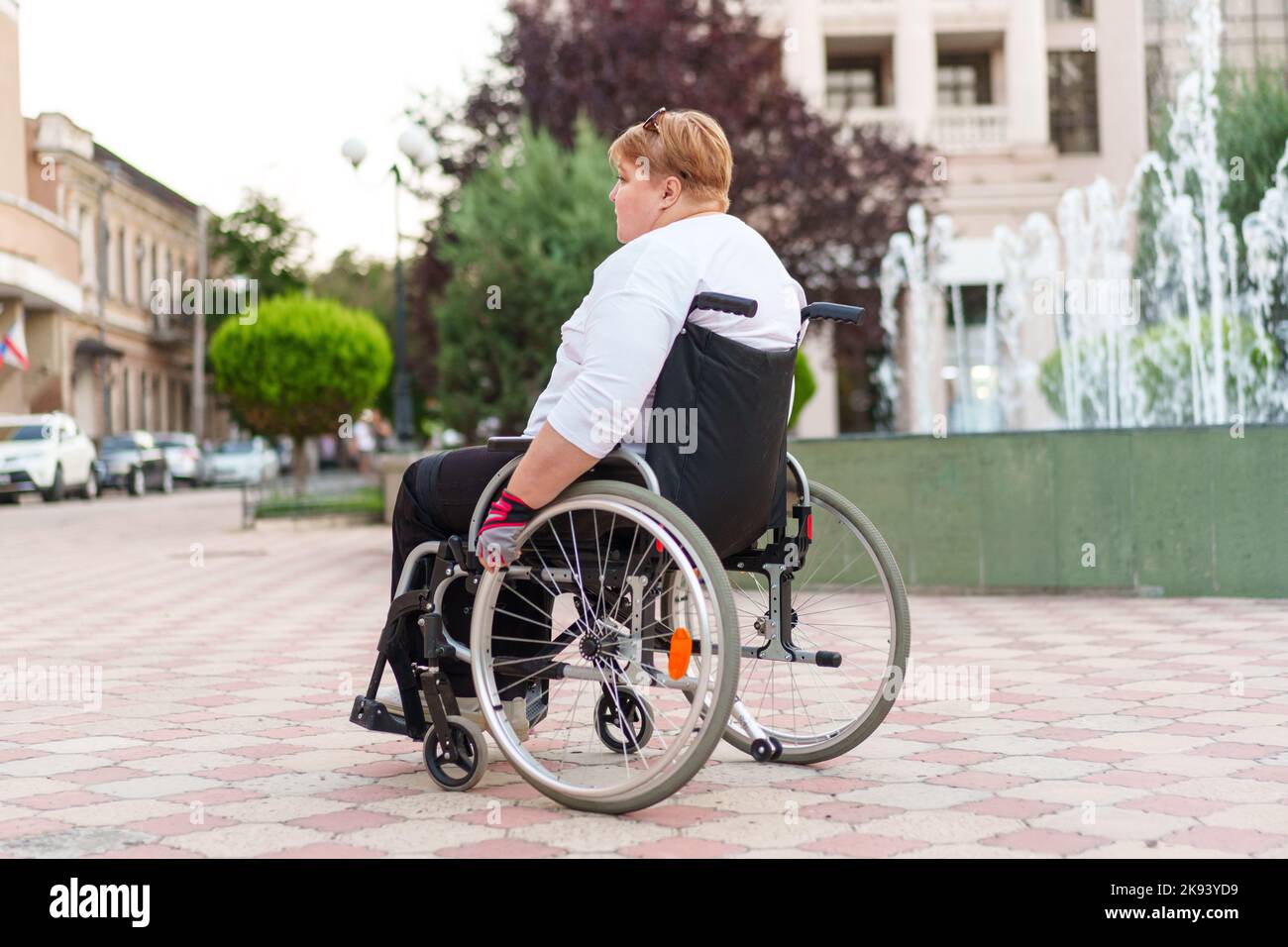 Woman who uses a wheelchair hi-res stock photography and images - Alamy