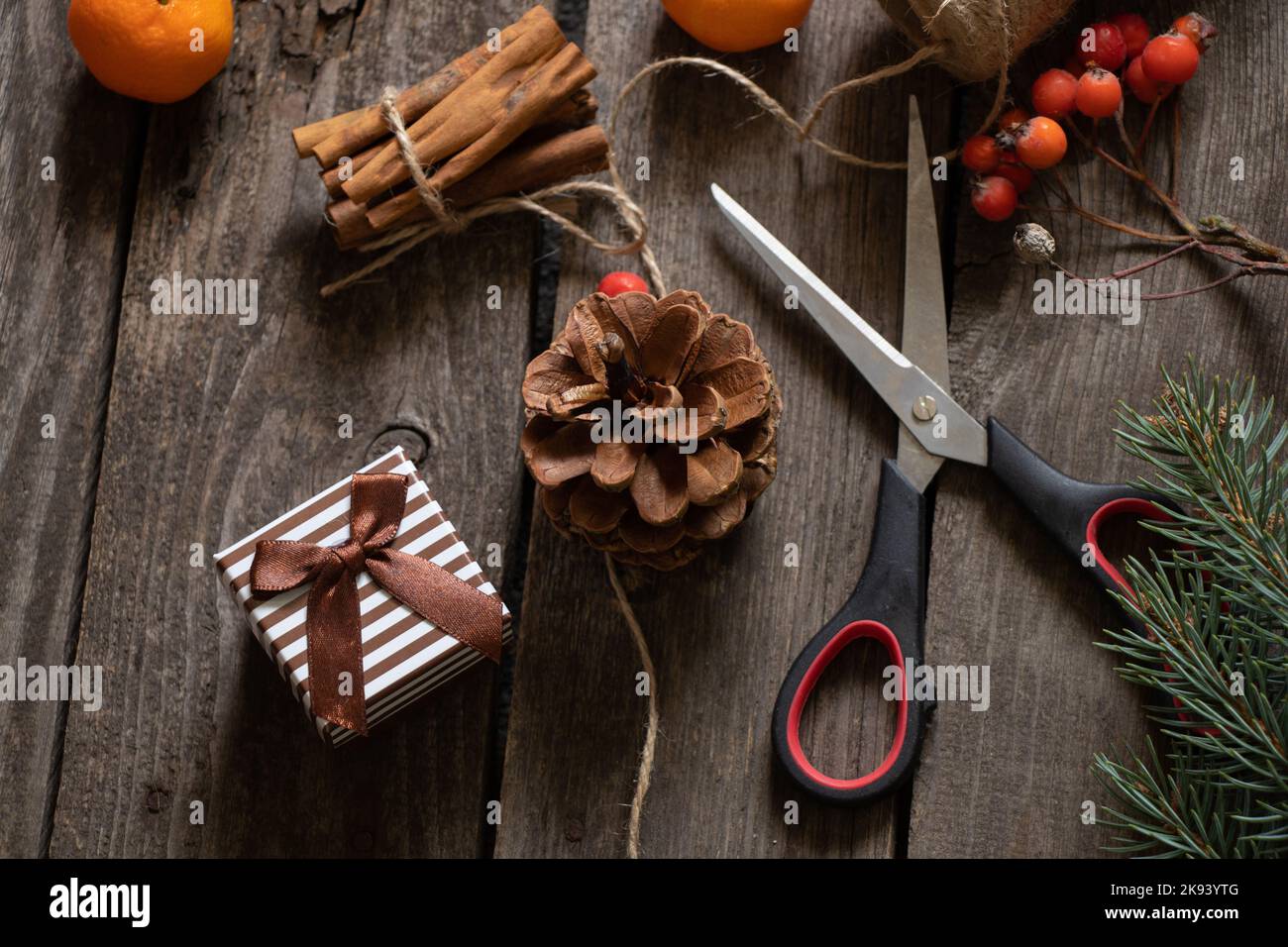 work table in the workshop for decorating gifts scissors cinnamon ...