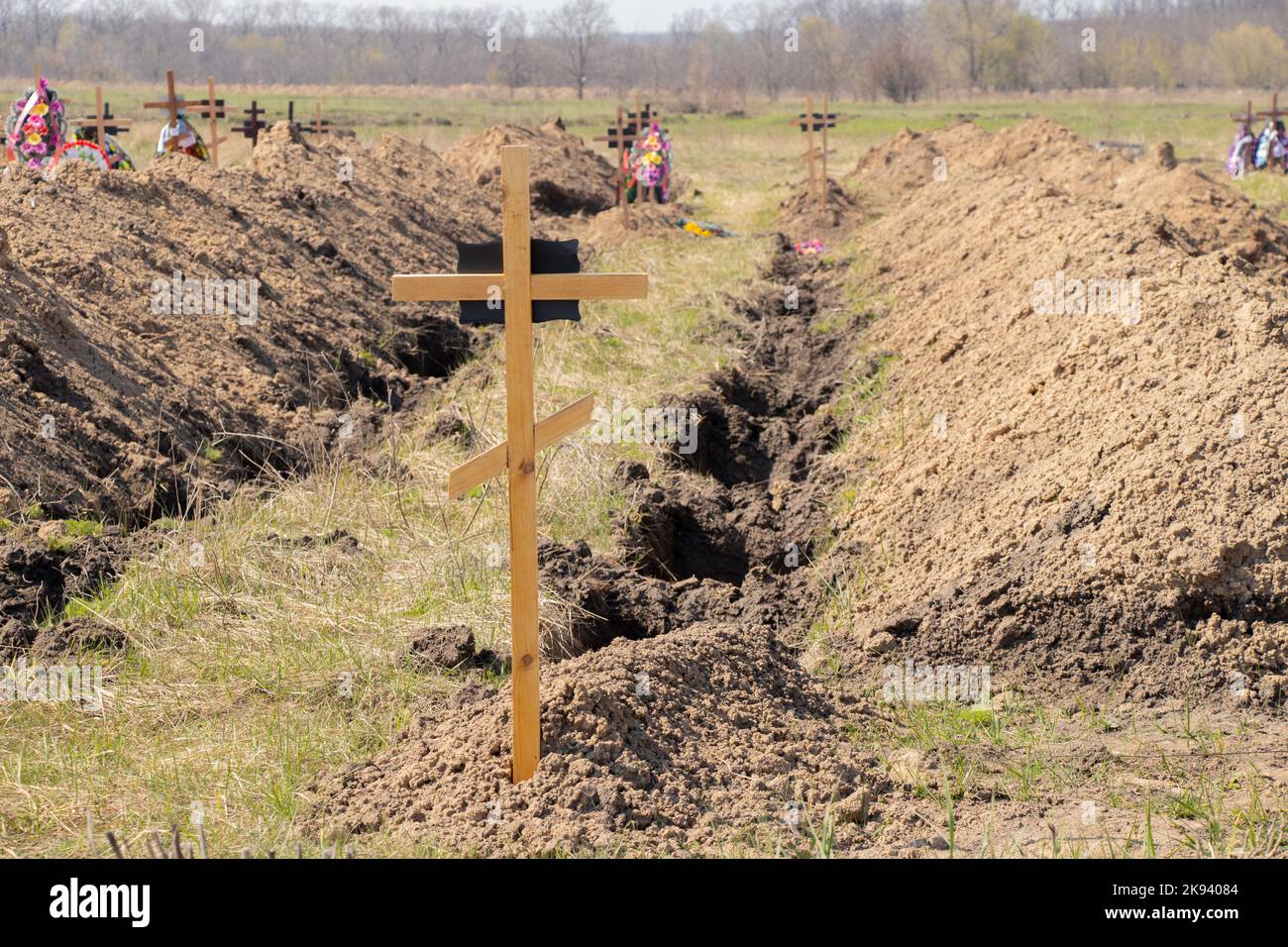 new dug graves, grave cemetery for those infected by coronavirus, Ukraine Dnieper Stock Photo