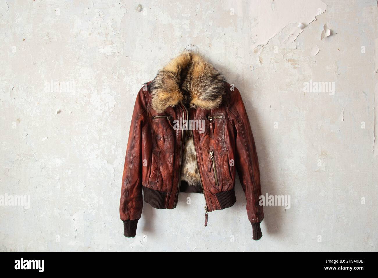 Coat hanger leather jacket hi-res stock photography and images - Alamy