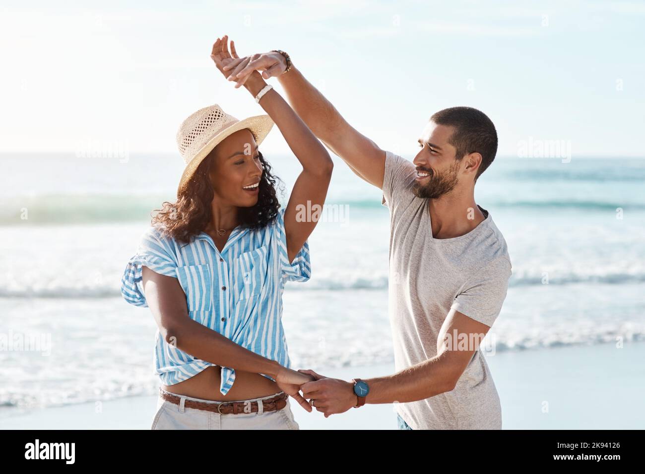 Ill whisk you off your feet again. a young couple dancing together at