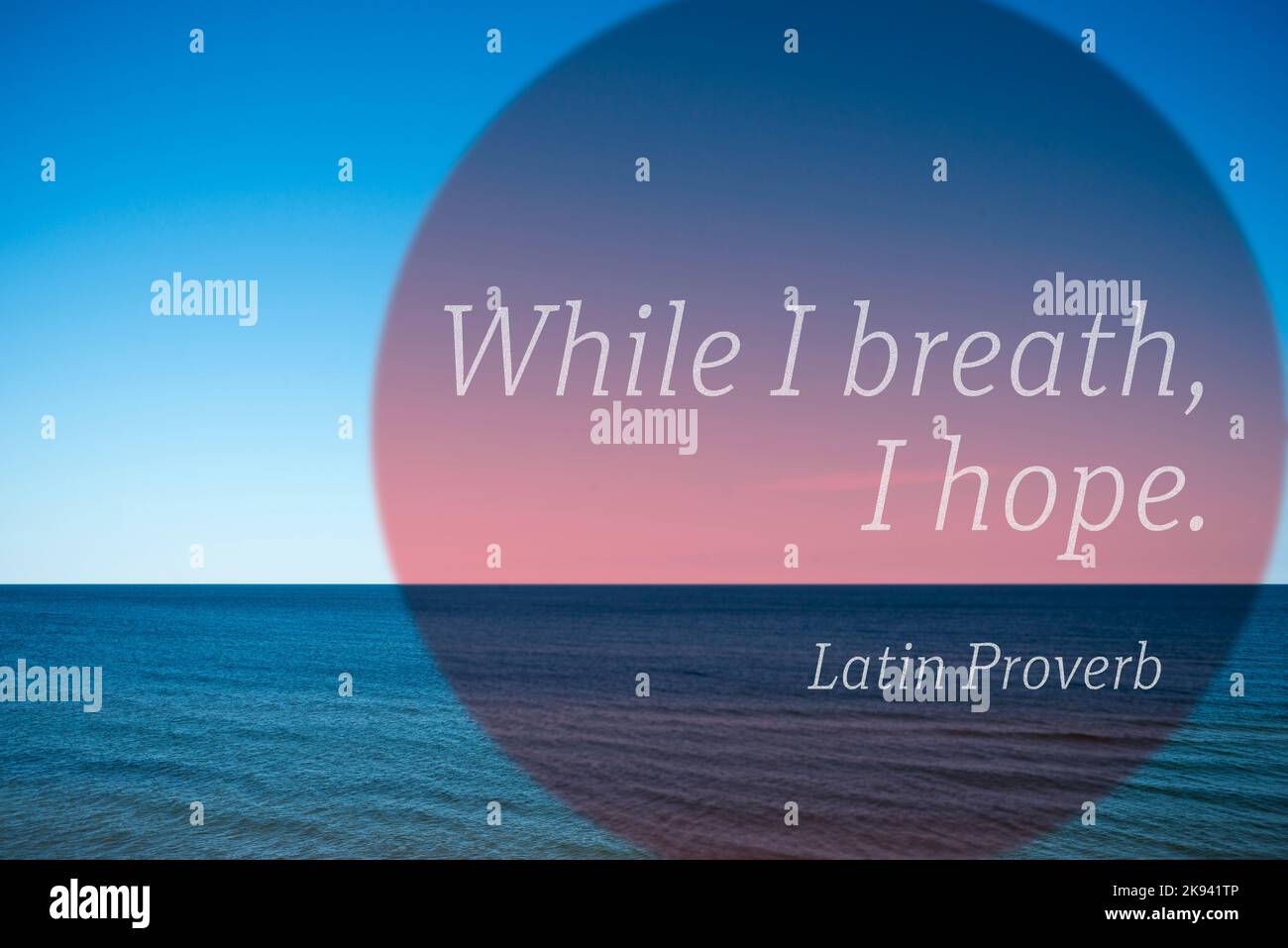 while I breath, I hope - ancient Latin Proverb printed over photo with calm sea landscape Stock Photo