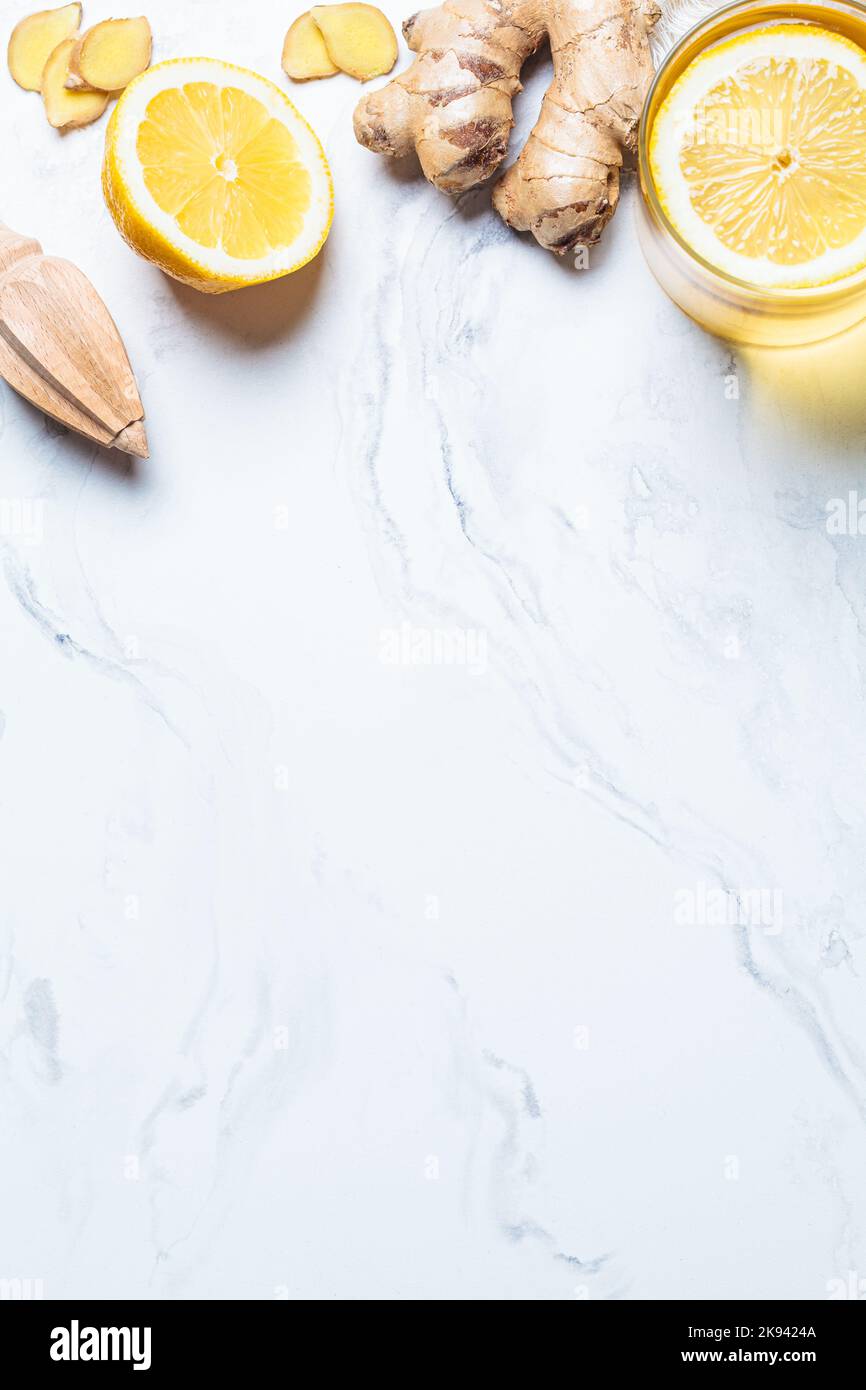 Ginger tea and ingredients background, copy space. Winter vitamin drink for immunity boosting
