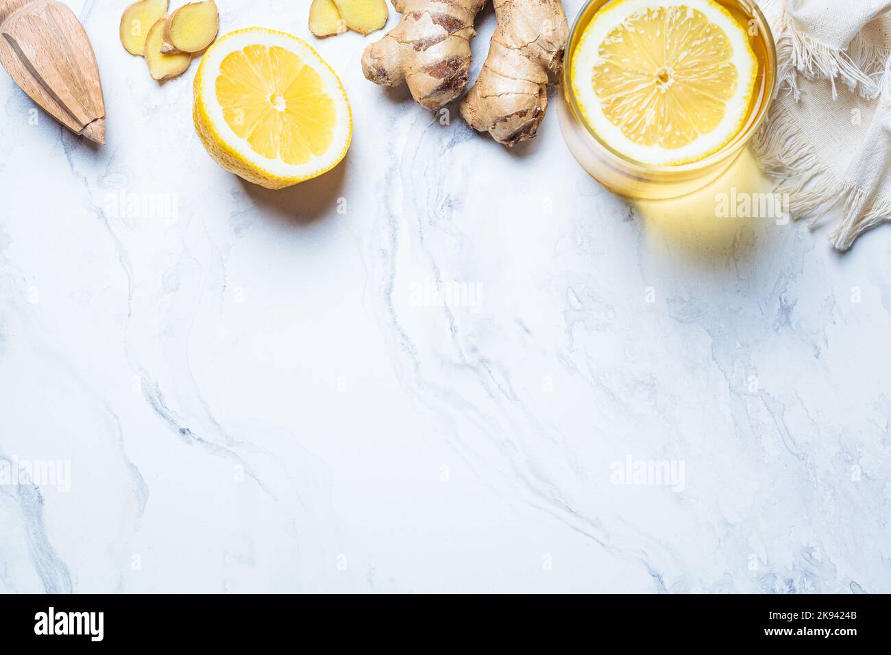 Ginger tea and ingredients background, copy space. Winter vitamin drink for immunity boosting