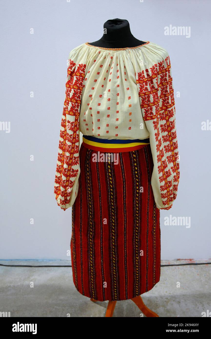 Moldavian folk woman clothing put on dummy. Hand-woven and hand-embroidered garments. Stock Photo