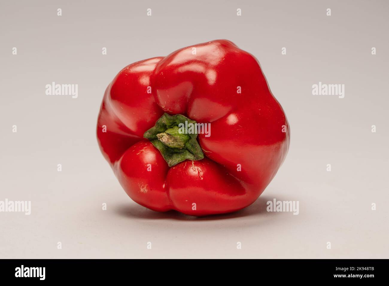 Red bell pepper isolated on white background Stock Photo - Alamy