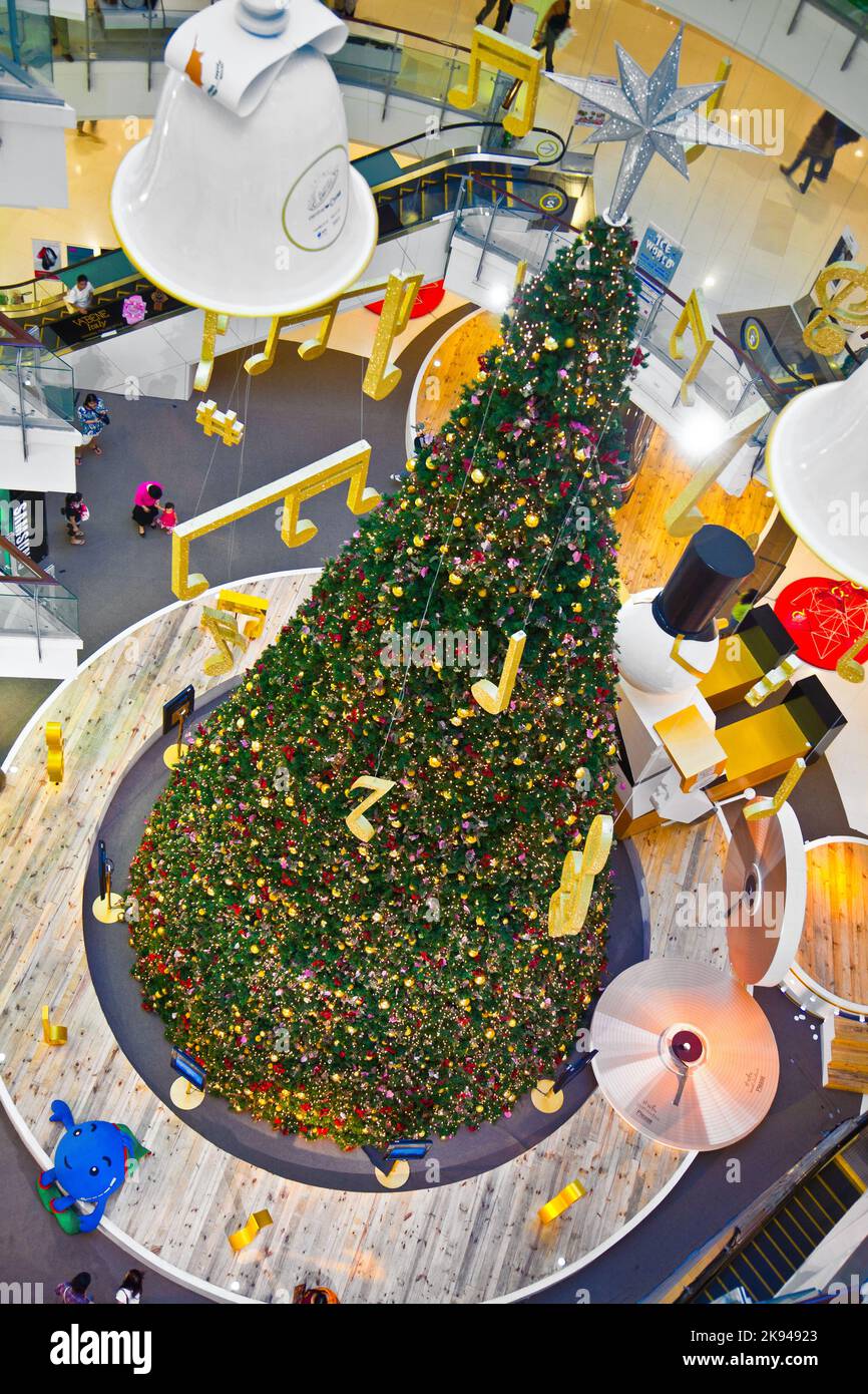 Bangkok, Thailand - DEcember 22, 2009: christmas tree inside the biggest shopping complex central world in Thailand  in Bangkok, Thailand. Stock Photo