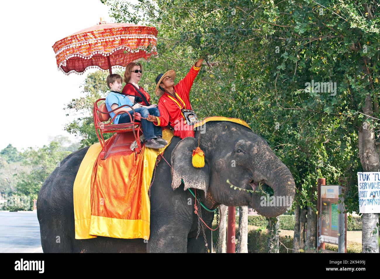 AYUTTHAYA, THAILAND - DEC 24: tourists on an elefant ride on December ...