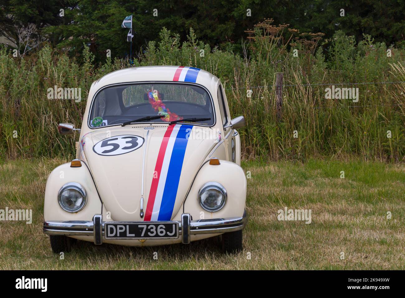 1970's Volkswagen Beetle car, VW Beetle, painted in the style of Herbie in the movie at The Love Bug at Chickerell Steam & Vintage Show, Dorset, UK Stock Photo