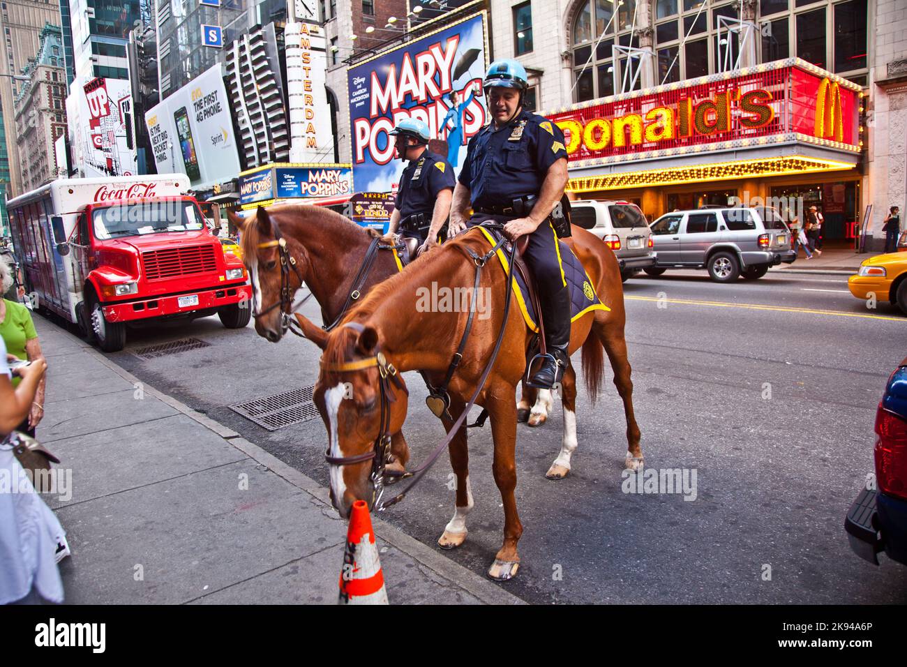 NEW YORK, USA JULY 7 policeofficer is riding his horse downtown in New York, Manhattan on