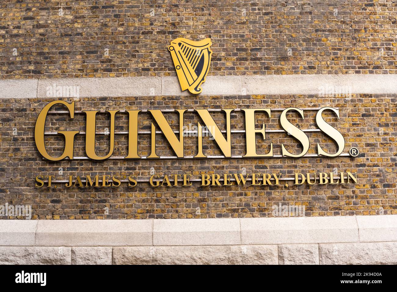 Ireland Eire Dublin St James's Gate Guinness Storehouse beer stout porter black ale modern golden wall mounted signage St James's Gate Brewery Stock Photo