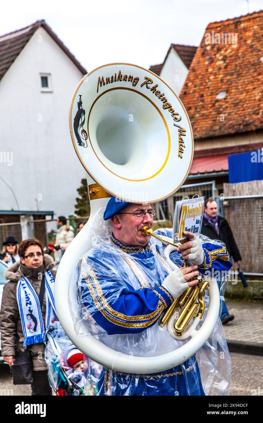 SCHWALBACH, GERMANY - FEBRUARY 27: The carnival  brass band  moves through the city on February 27, 2011 in Schwalbach, Germany. The Brass Band Rheinm Stock Photo