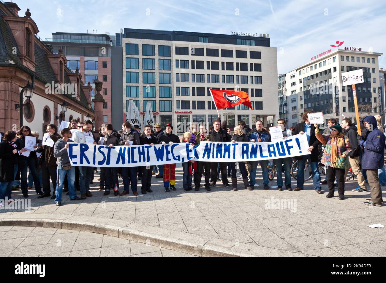 FRANKFURT, GERMANY - March 5: People demonstrate for return of Karl Theodor zu Guttenberg into politics on March 5,2010 in Frankfurt, Germany. Guttenb Stock Photo