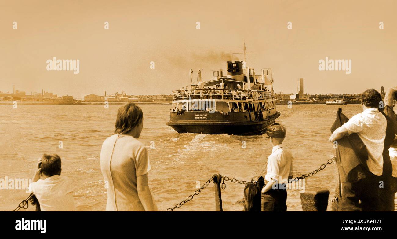 Vintage Liverpool 1968, the Egremont ferry setting sail across the river Mersey, viewed by passengers from the landing stage, pier head. Sepia image Stock Photo