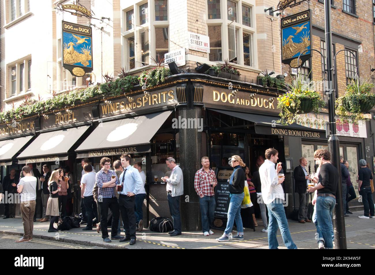 Lunch time on a sunny day in London, Dog and Duck Pub, Soho, London, UK Stock Photo