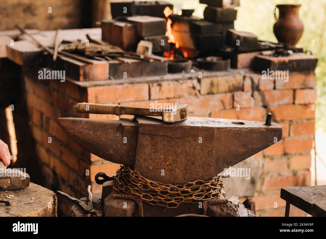 hammer on an anvil standing on the street Stock Photo Alamy