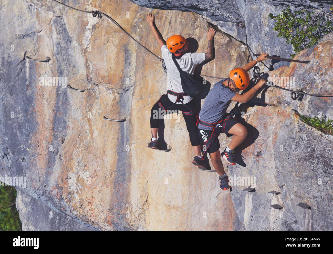 climber at rock face of via ferrata La Chapelle d' Abondance, France, Haute Savoie Stock Photo