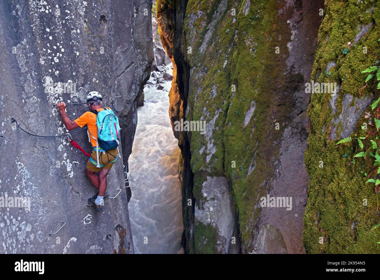 Climber at the Via ferrata at the canyon of Ailefroide, France, Hautes Alpes, Brianconnais Stock Photo