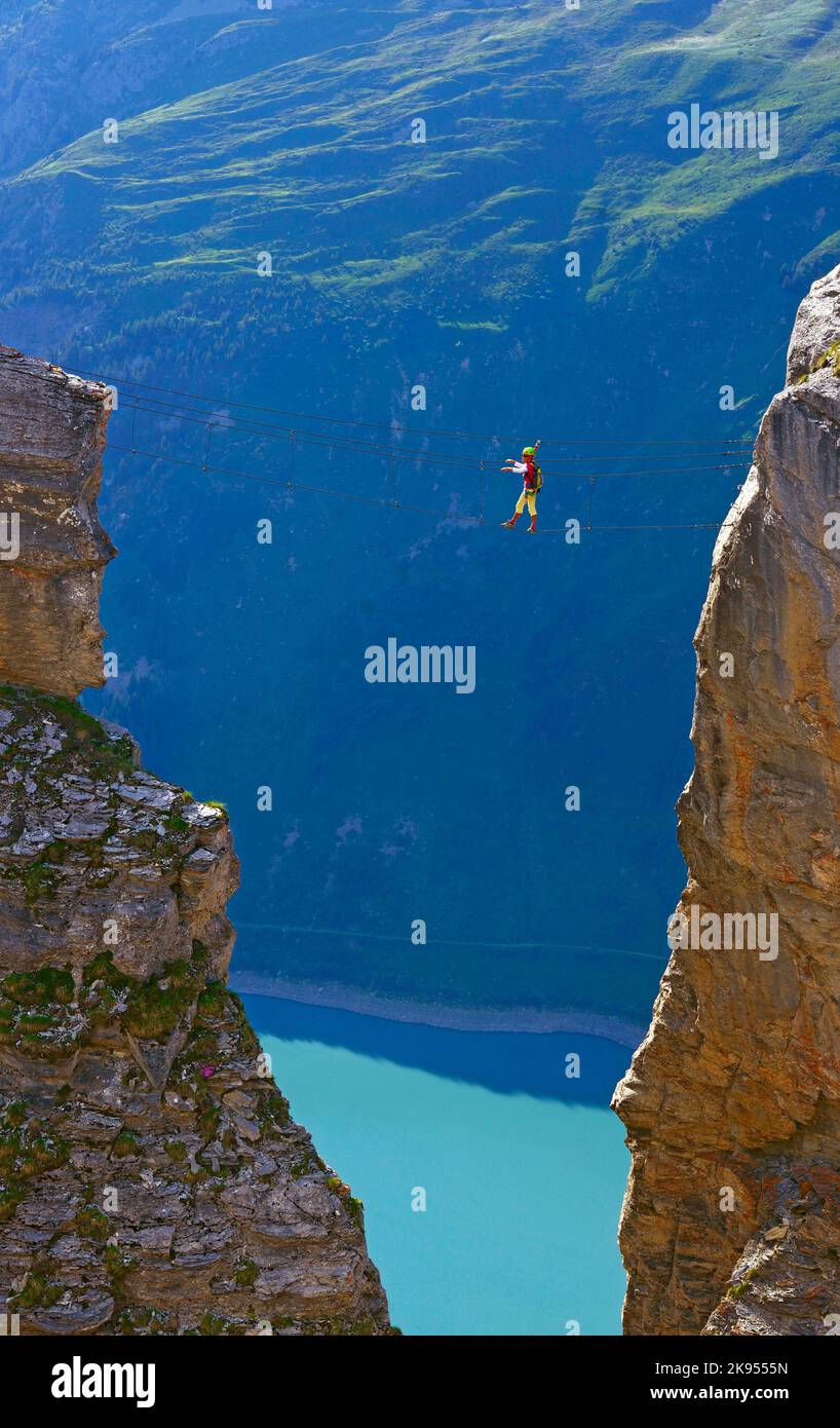 rope bridge between two rocks above the Gittaz reservoir, Via Ferrata
