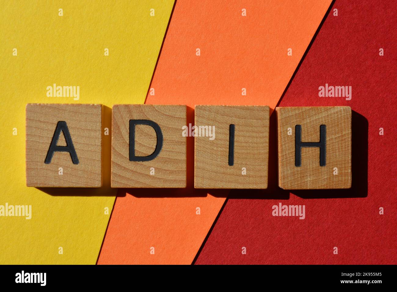 ADIH, abbreviation for Another Day In Hell, slang used is text speak, in wooden alphabet letters isolated on background Stock Photo