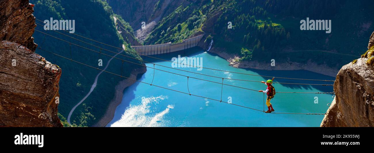 rope bridge between two rocks above the Gittaz reservoir, Via Ferrata