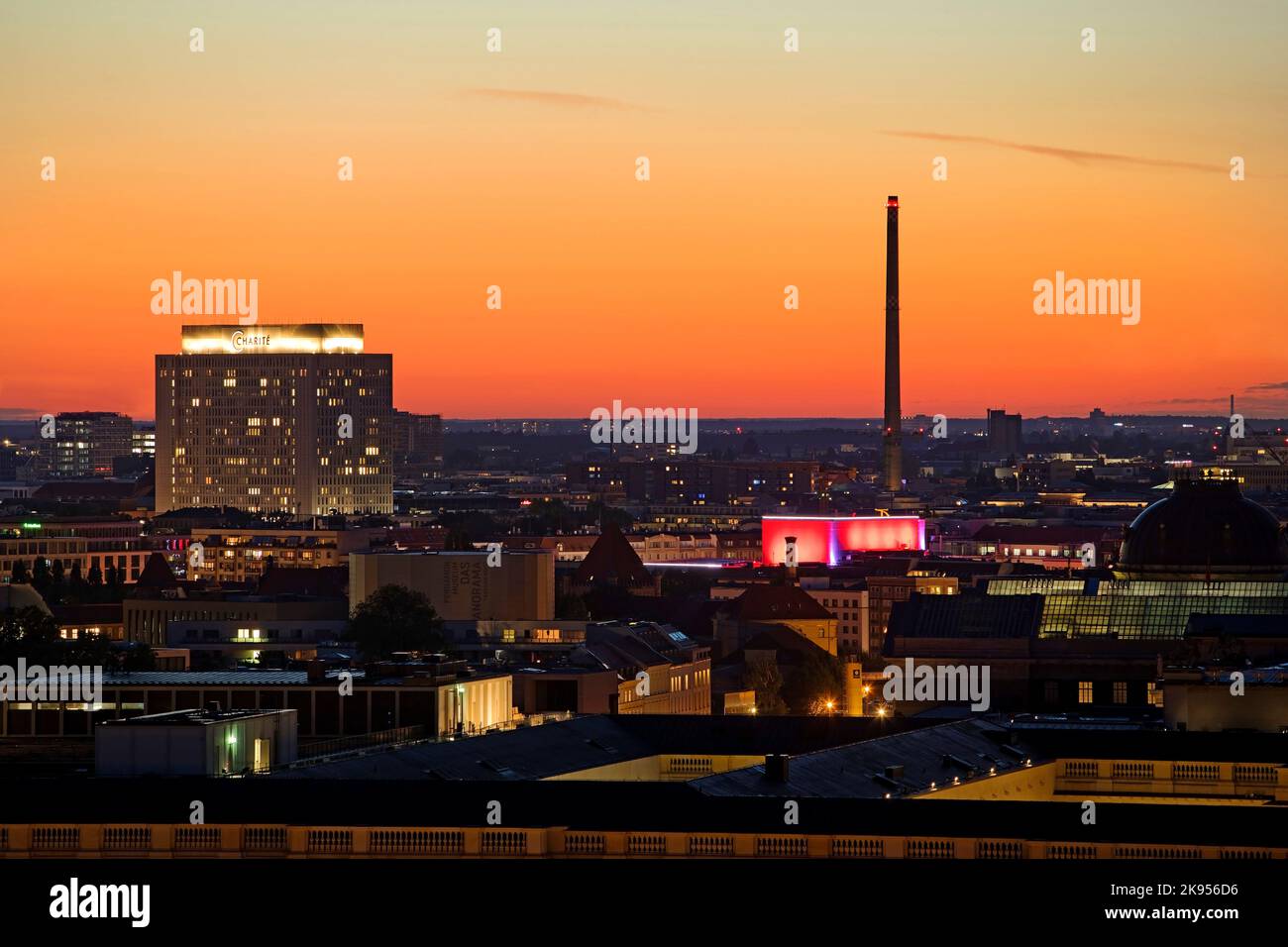 Charite University Hospital and stack of the combined heat and power plant Scharnhorststrasse in the sunset, Germany, Berlin Stock Photo