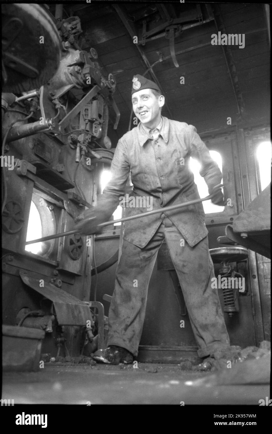 Work environment in steam locomotive. Elders at work Stock Photo - Alamy