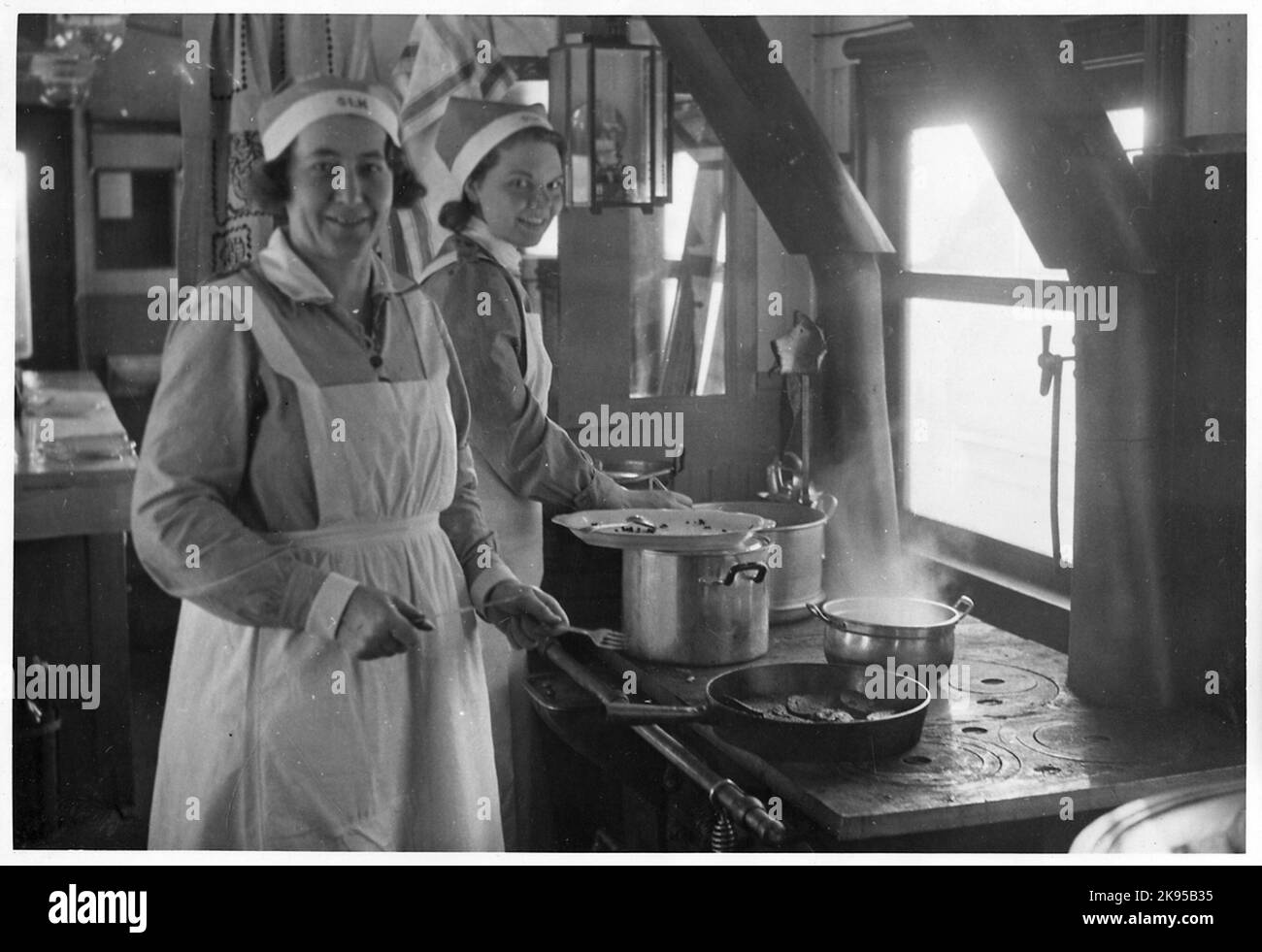 Interior from kitchen wagon in military train Stock Photo - Alamy