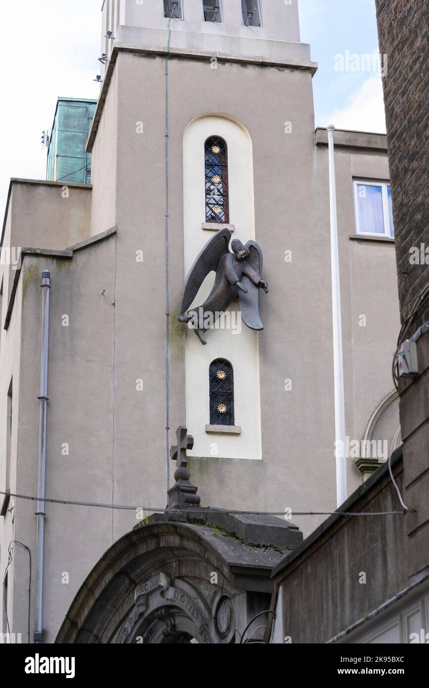 Ireland Eire Dublin Clarendon Street St Theresa's Carmelite Church founded 1792 mass live-streamed worldwide modern figure angel bell tower Stock Photo