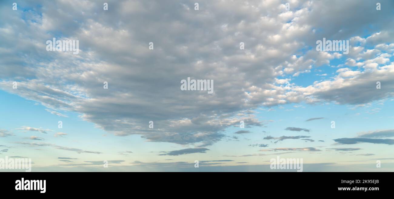 Beautiful sunset sky with some clouds during summer on a nice day Stock Photo