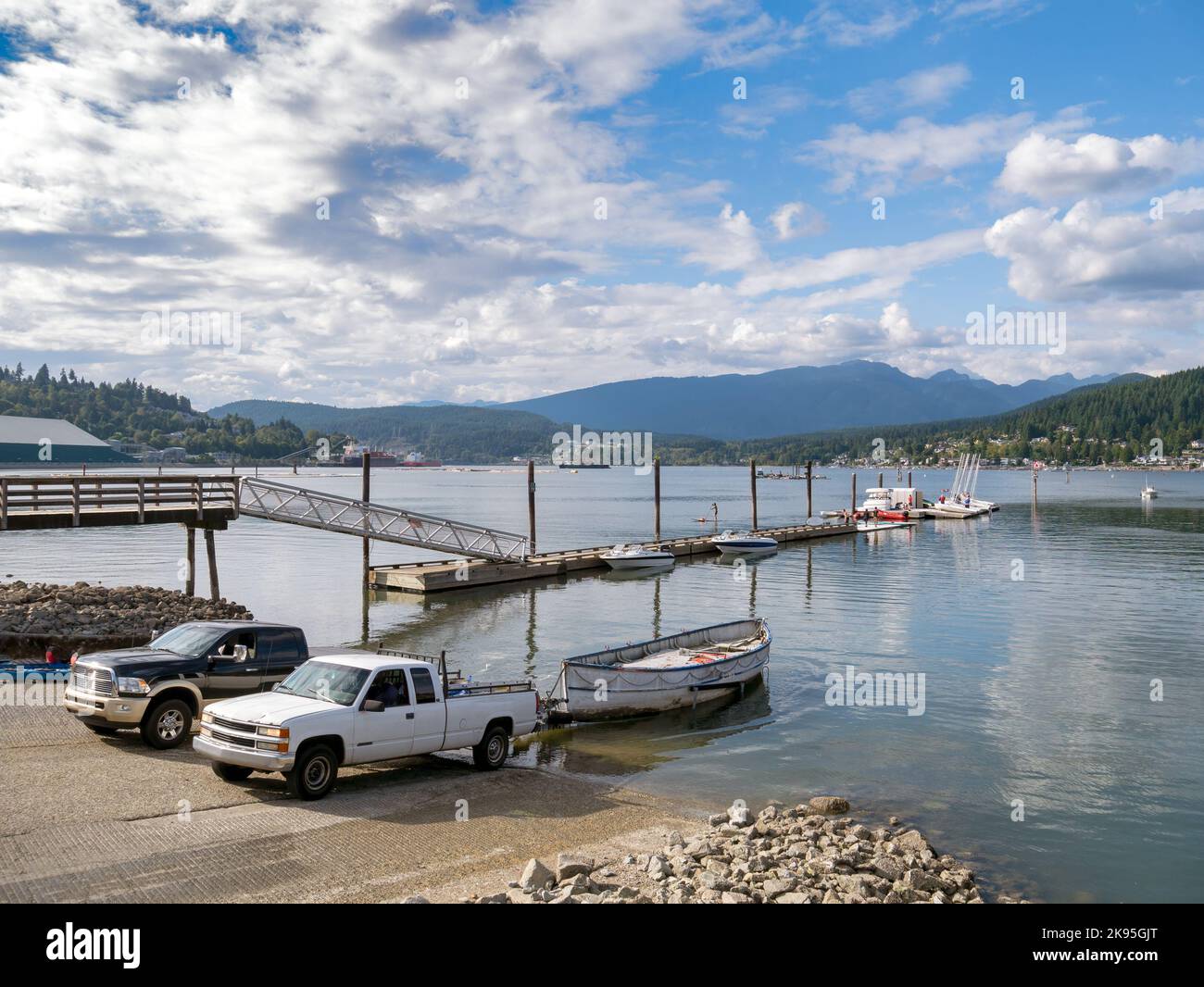 Boat towing tracks with trailers on Port Moody inlet Stock Photo