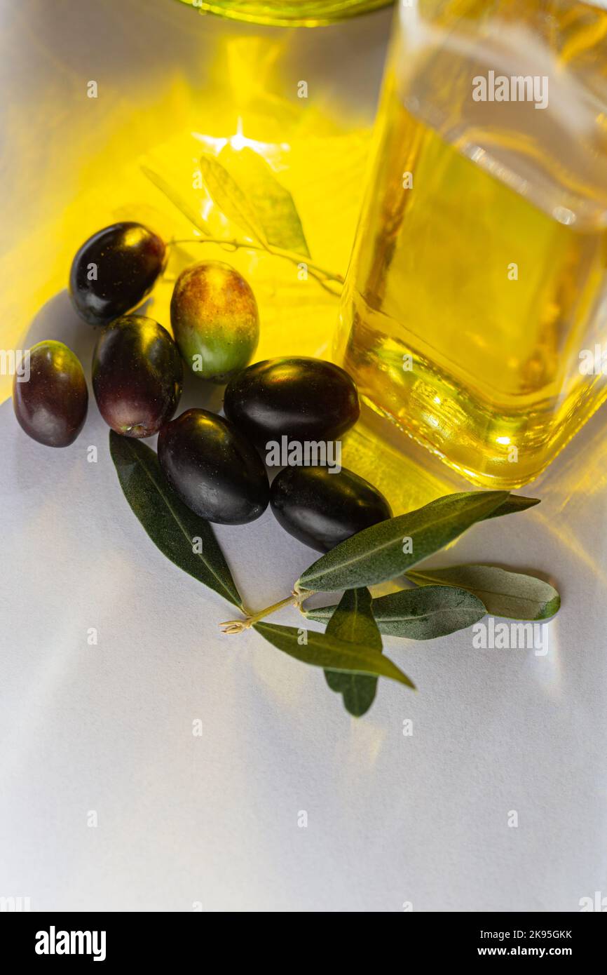 olive oil and olives with branch Stock Photo - Alamy