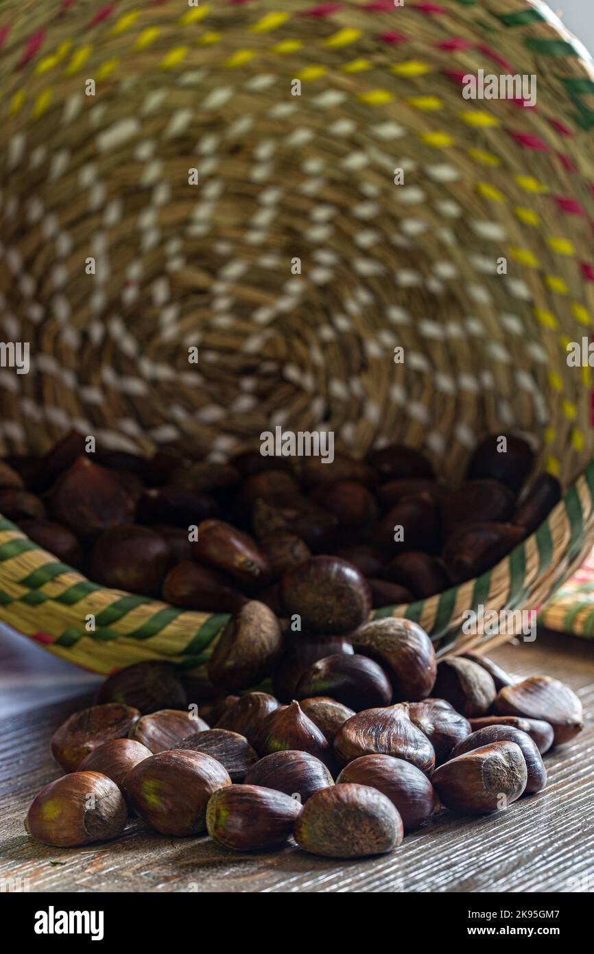 chestnuts in the overturned basket Stock Photo