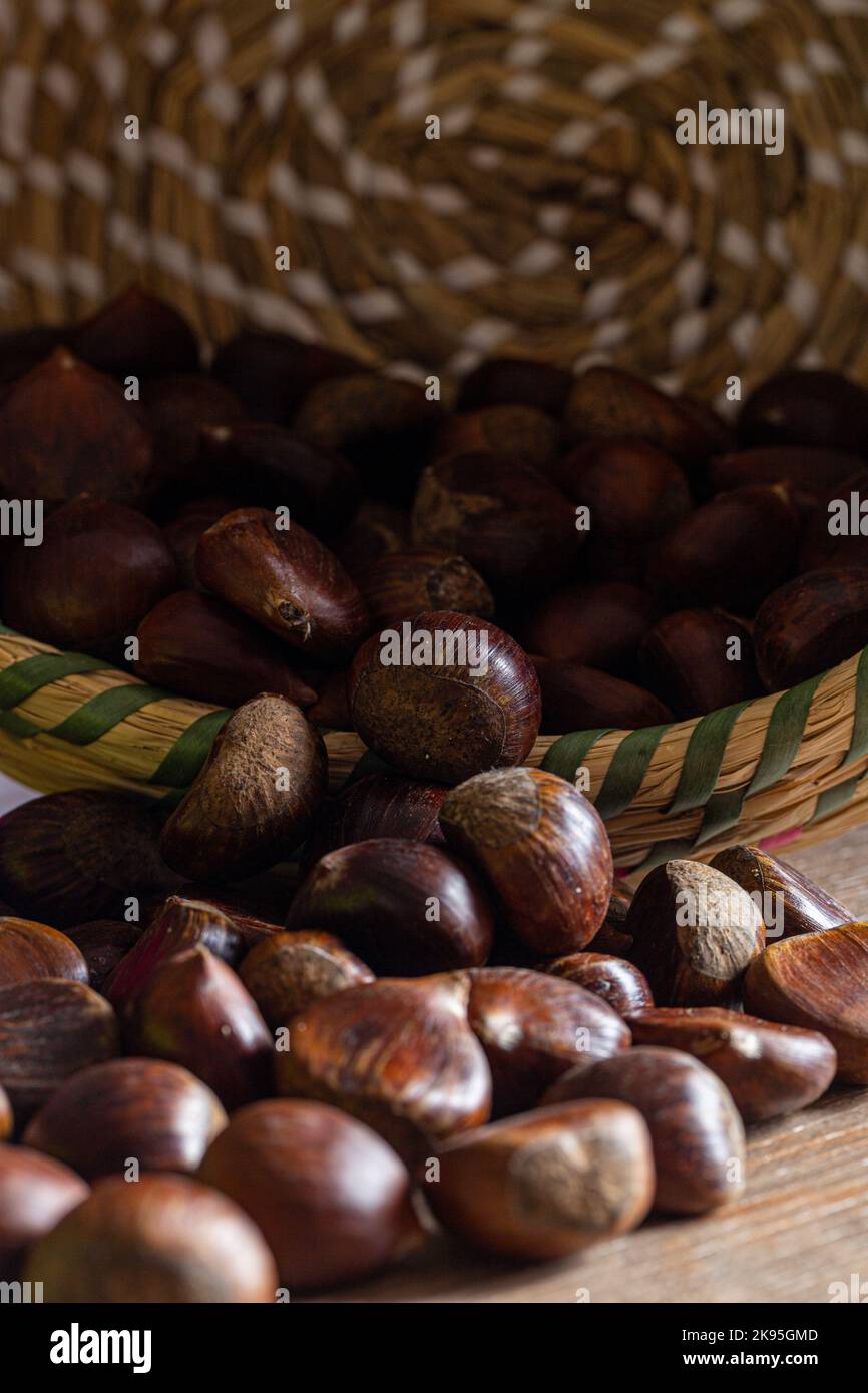 chestnuts in the overturned basket Stock Photo