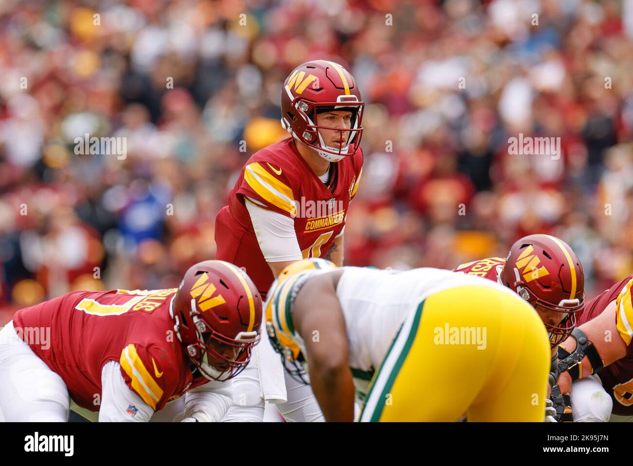 Santa Clara, California, USA. 24th Dec, 2022. Washington Commanders  quarterback Taylor Heinicke (4) gives San Francisco 49ers defensive end Jordan  Willis (75) stiff arm on Saturday, December 24, 2022, at Levis Stadium