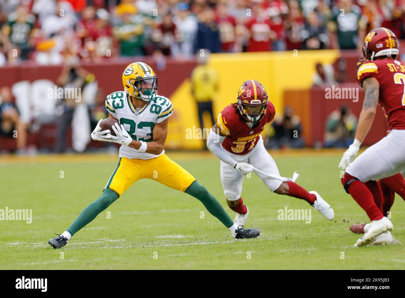 Sunday, October 23, 2022; Landover, MD, USA;  Green Bay Packers wide receiver Samori Toure (83) makes the reception and runs with the ball during an N Stock Photo